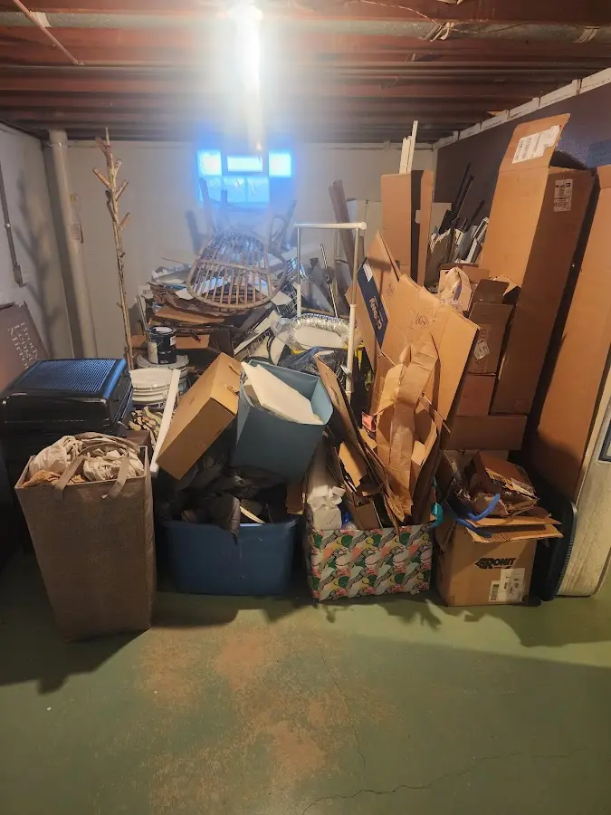 Roll-off dumpster container at job site for 6 Yard Dumpster Rental in Blanding